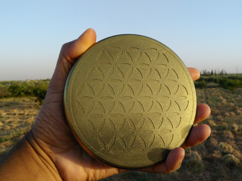 holding brass orgone chargeplate